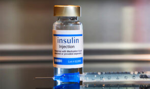Bottle of insulin and needle