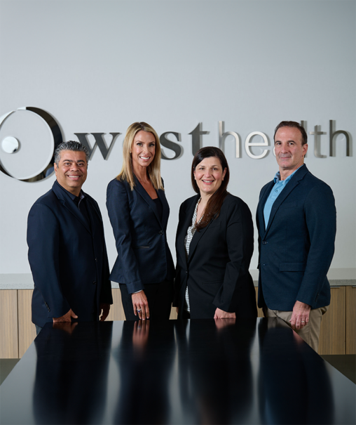 Executives of West Health posing for a professional photo